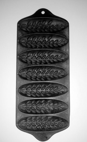 Sold at Auction: N WATERMAN CAST IRON OVAL MUFFIN PAN, BOSTON