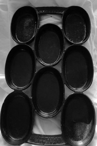 Sold at Auction: N WATERMAN CAST IRON OVAL MUFFIN PAN, BOSTON