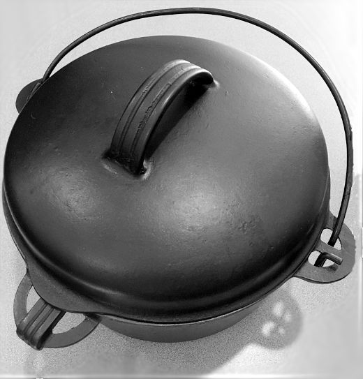 Vintage Cast Iron Lodge number (8) DO Dutch Oven was made in the 1950s.  W/Lid